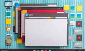 Jak zainstalować Windows na nowym komputerze? Papierowa grafika przedstawia okna programów, ikony i pulpit, sugerując proces instalacji.