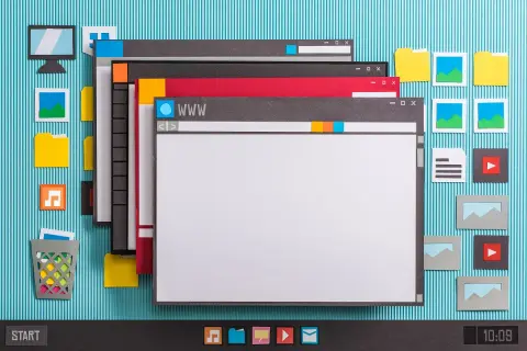 Jak zainstalować Windows na nowym komputerze? Papierowa grafika przedstawia okna programów, ikony i pulpit, sugerując proces instalacji.