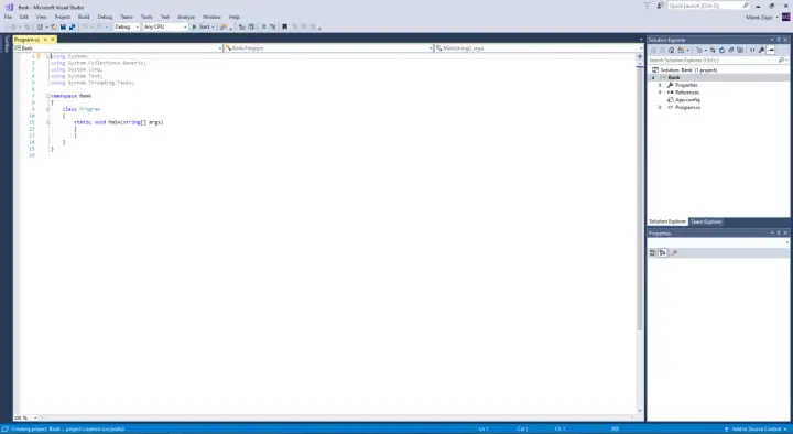Widok kodu C# w Visual Studio. Widoczny jest plik Program.cs z podstawową strukturą klasy Program i metodą Main. W panelu Solution Explorer widać projekt "Bank".